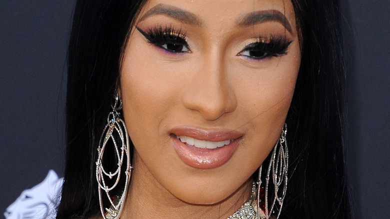 Cardi B smiling on the red carpet