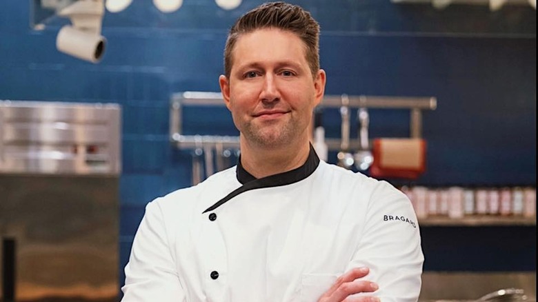 Alex Belew in his chef's jacket 