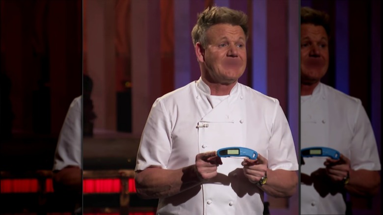 Gordon Ramsay holding meat thermometer