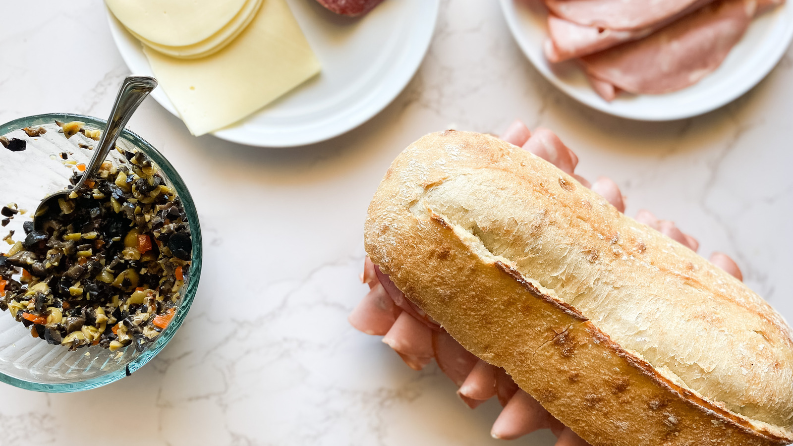 The Herbs You Need For The Best Muffuletta Sandwich Olive Spread