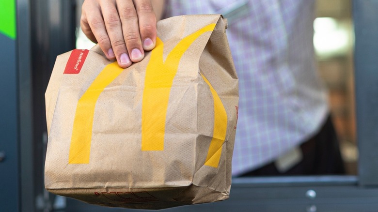 McDonald's drive-thru worker giving order