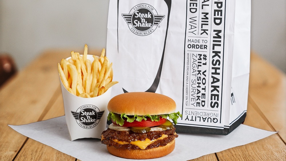 Steak 'n Shake bag, steakburger, and fries