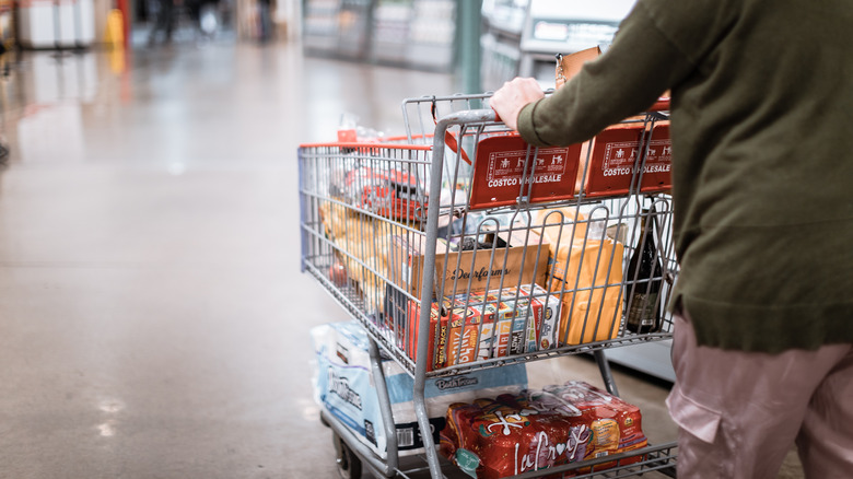 Costco customer pushing a cart