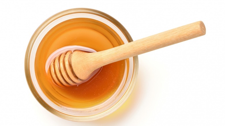 honey in bowl with spoon