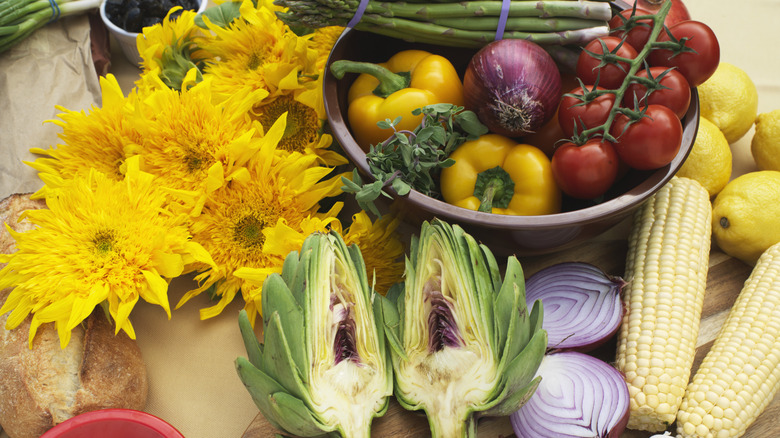 Fresh food and flowers on a table