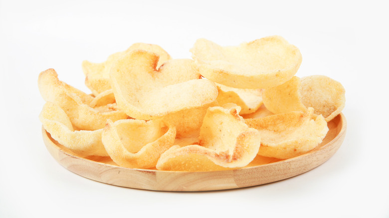 Shrimp crackers on wooden plate