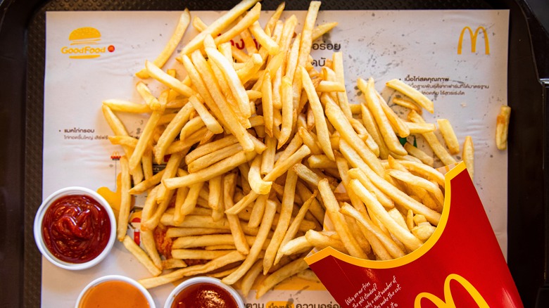 Mcdonald's french fries spilling on a tray