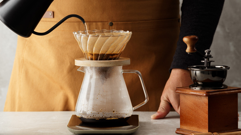 Barista making pour-over coffee