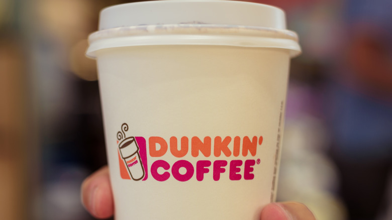 Dunkin' takeout coffee cup