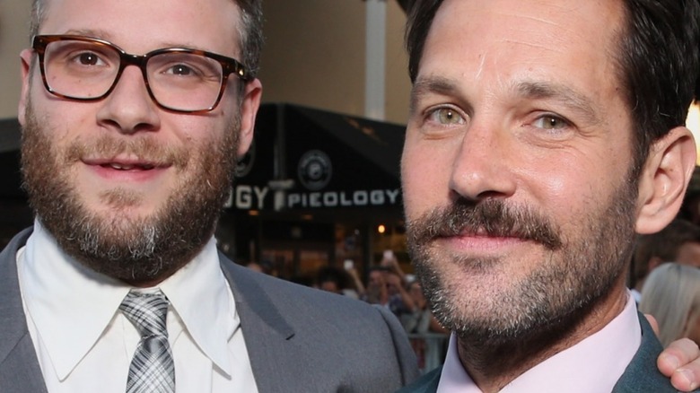 Seth Rogen and Paul Rudd smiling at an event