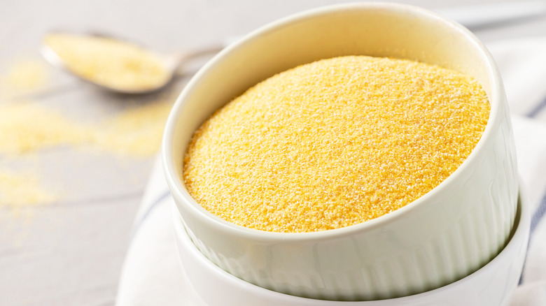 Dry polenta in white bowl