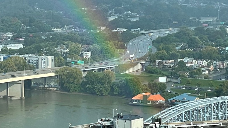 Rainbow hitting an orange roof
