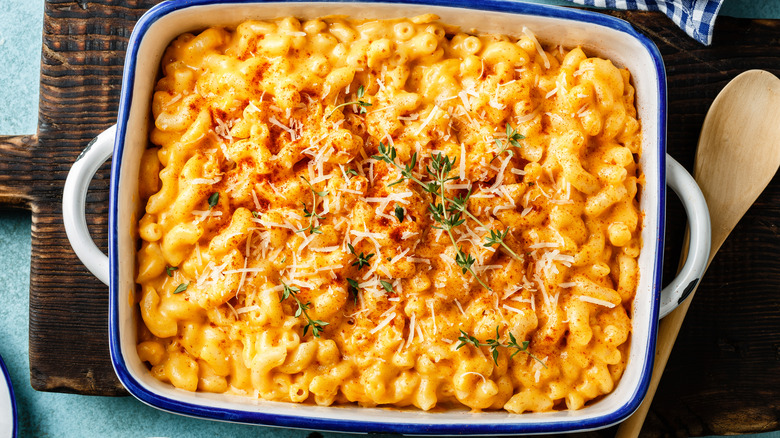 Mac and cheese. traditional american dish macaroni pasta and a cheese sauce  by: Sunny Forest🔍
