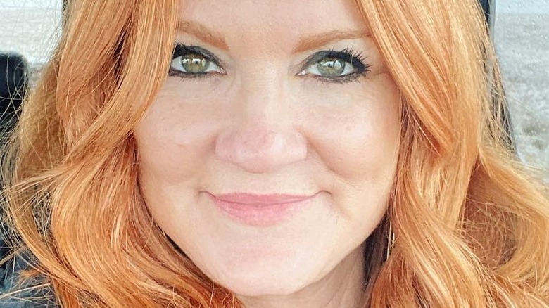 Ree Drummond smiling in car selfie with hair down