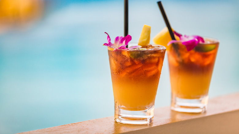 Mai tai cocktails and ocean