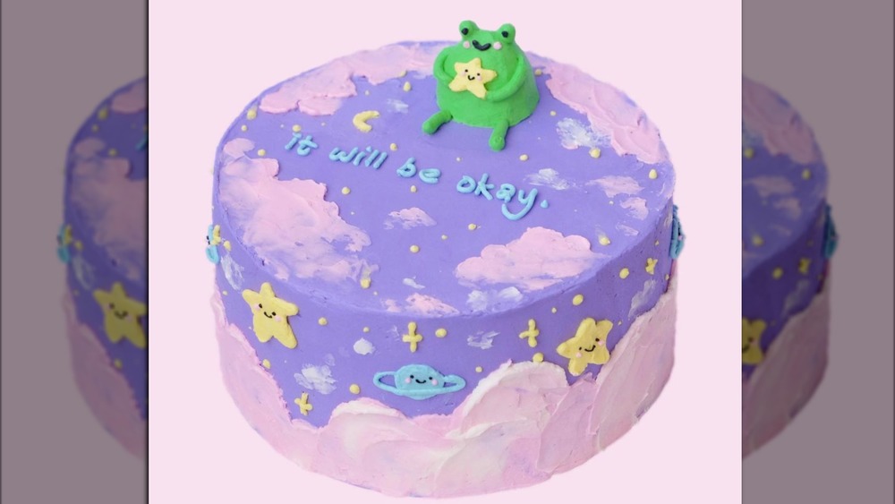 frog cake with sky-themed icing