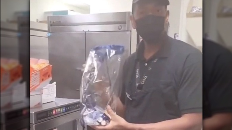 Burger King employee with gift
