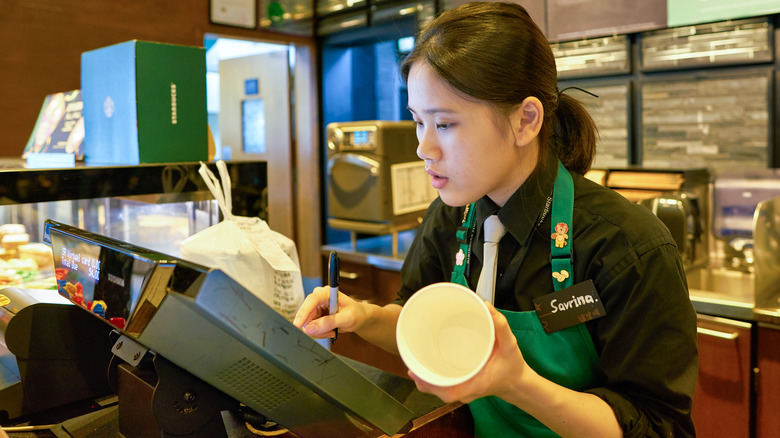 a baffled Starbucks employee