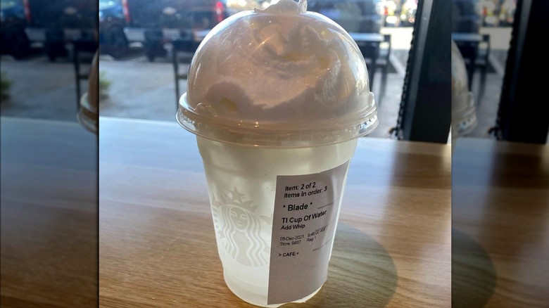 Starbucks cup of water with whip
