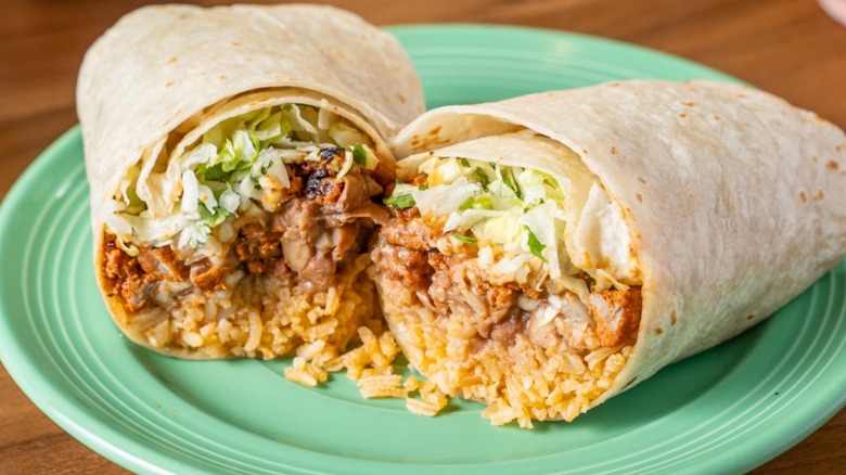 Pork burrito with rice and lettuce