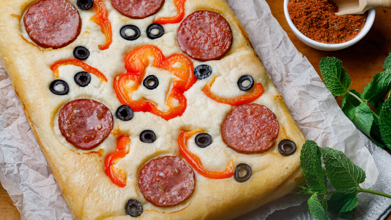 Pizza with pepperoni and peppers