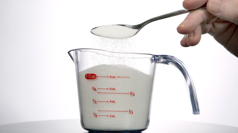 Sugar in measuring cup