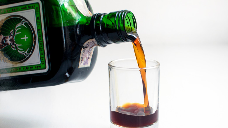Jagermeister pouring into a shot glass