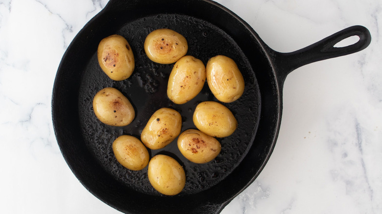 Roasted baby potatoes in skillet