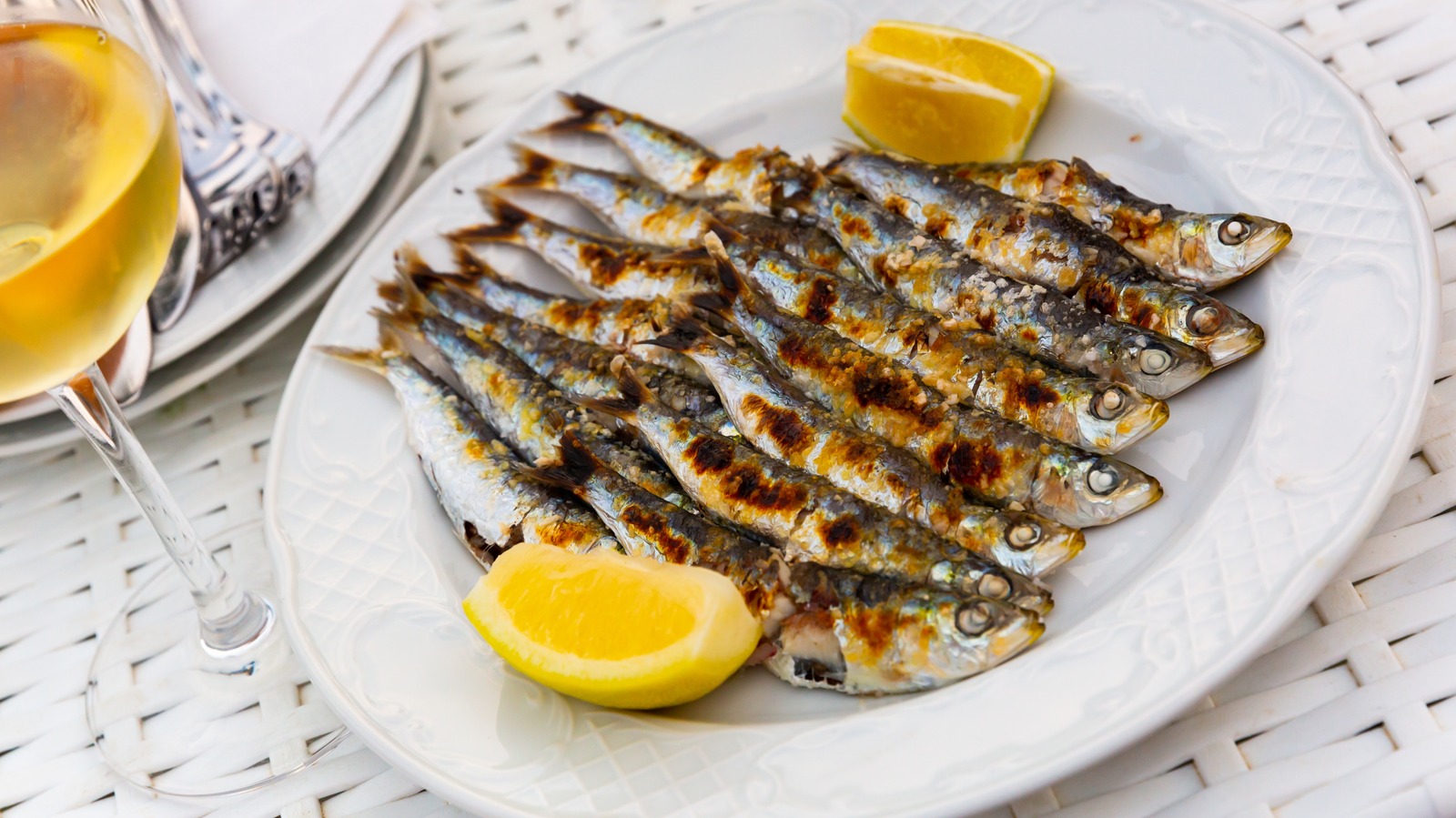 The Key Flavor Difference Between Sardines And Anchovies