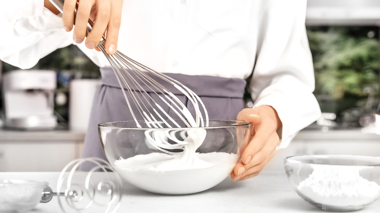 Making whipped cream with whisk