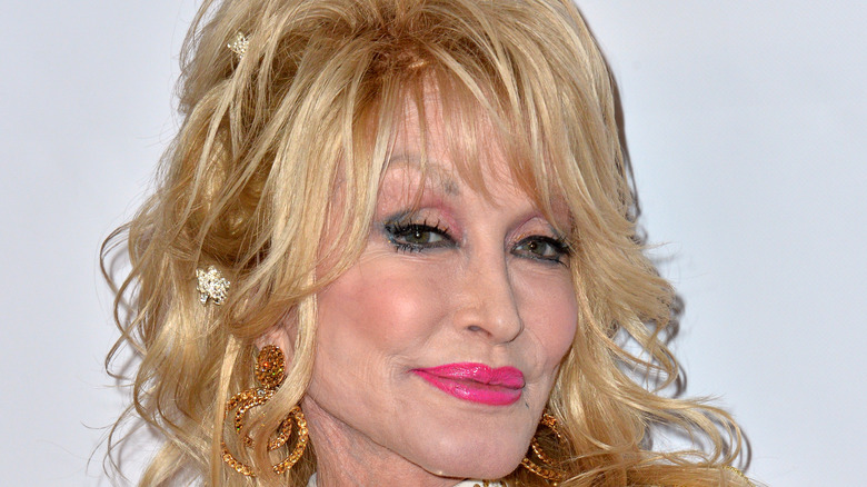 Dolly Parton smirking