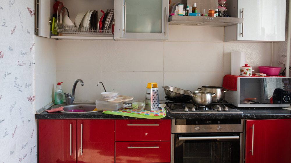 Home kitchen with cluttered counters