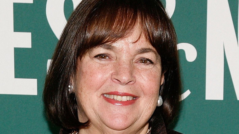 Ina Garten wearing red lipstick and smiling