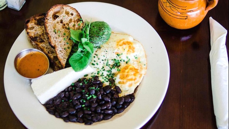 Eggs, beans, cheese, and toast at Gloria's