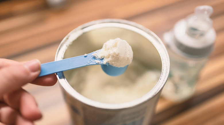 Baby formula in a silver can