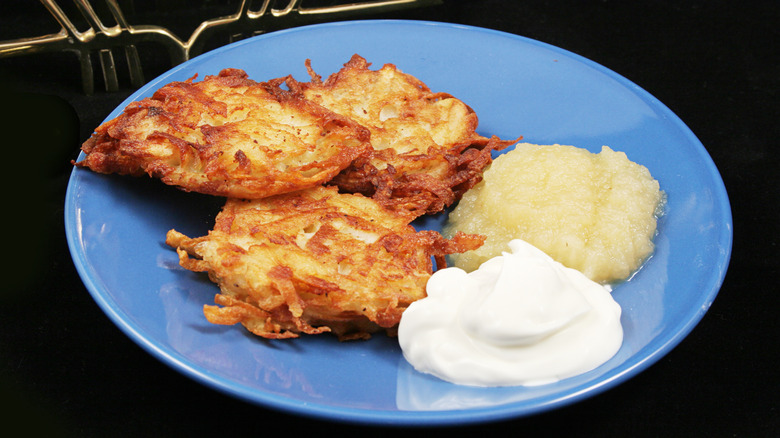 Latkes, sour cream, and applesauce