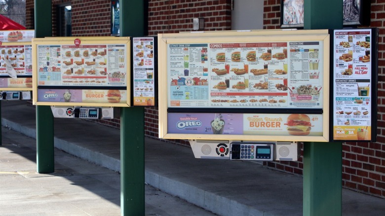Sonic drive-in menus in the store's parking lot