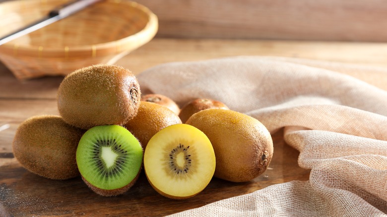 pile of kiwis on counter
