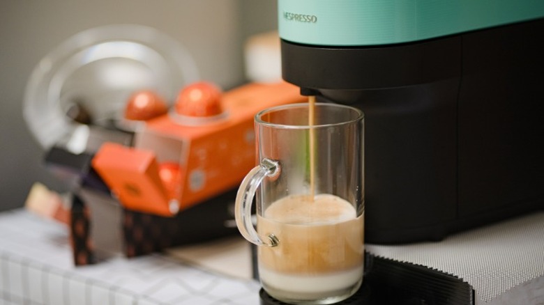 Nespresso machine brewing coffee