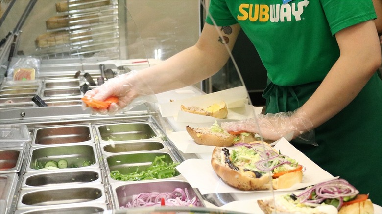 Subway employee at work