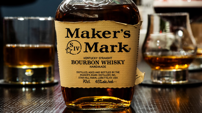 Maker's Mark bottle and glasses of whiskey