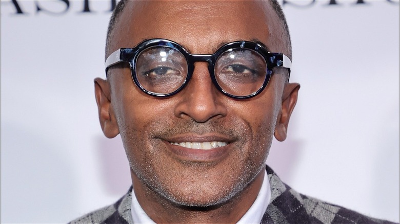 marcus samuelsson with glasses on smiles