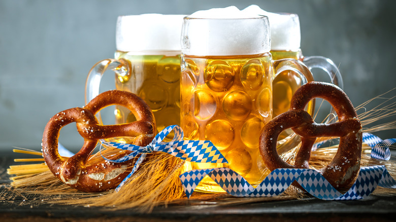 Steins of beer and pretzels