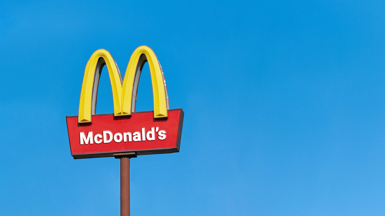 McDonald's sign against a blue sky