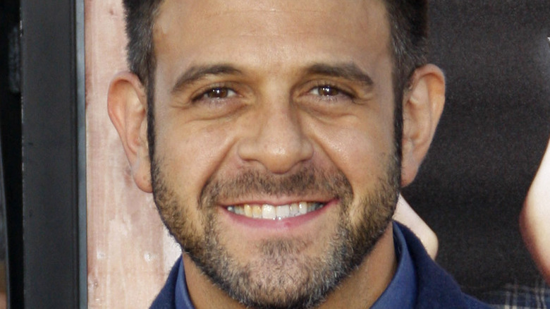 Adam Richman smiles in close-up