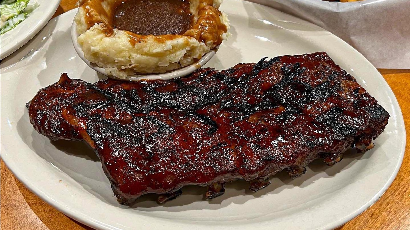 The Method Behind Texas Roadhouse's Fall-Off-The-Bone Ribs