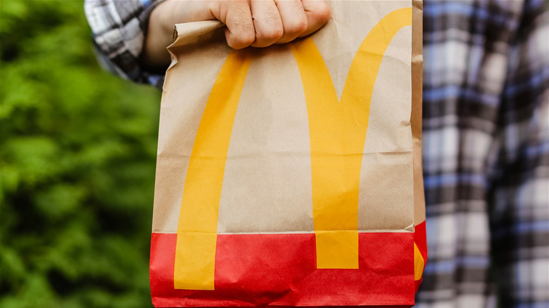 Man holding McDonald's bag