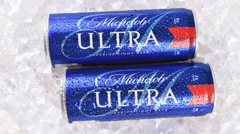 Two cans of Michelob Ultra on ice