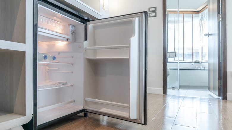 open mini fridge under counter