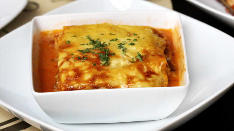 bubbling mini lasagna with salad